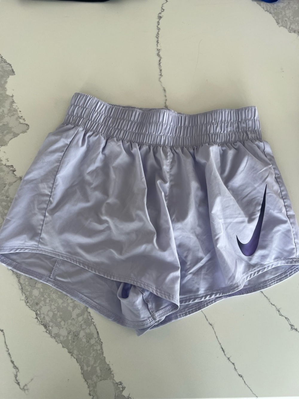 Nike Women's Light Lavender Athletic Running Shorts with Purple Swoosh